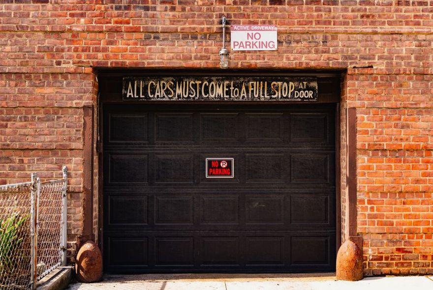 Photo of garage door repair warning signs work